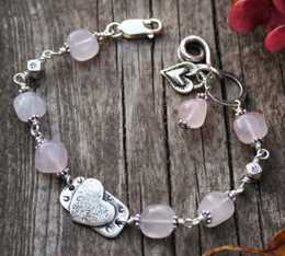 handmade bracelet beaded with gemstones and sterling silver charms